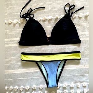 swimsuit top is by Hollister , bottom by Victoria Secret